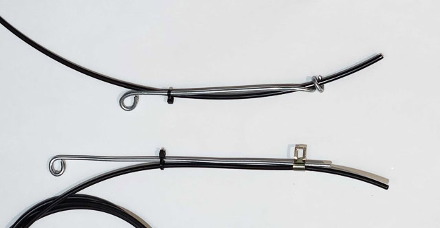 photos of two steel wires and hoses attached to  them