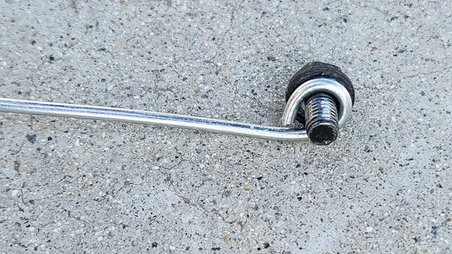 photo of a bolt inside a tight wire loop